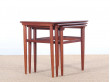 Danish mid-century modern nesting tables in teak and ceramic