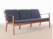 Banquette scandinave 3 places en acajou blond.