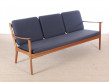 Banquette scandinave 3 places en acajou blond.