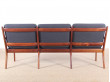 Banquette scandinave 3 places en acajou blond.