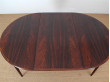 Scandinavian round dining table in Rio rosewood