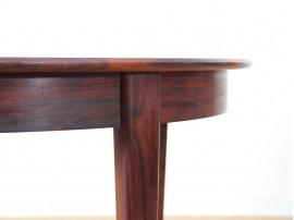 Scandinavian round dining table in Rio rosewood