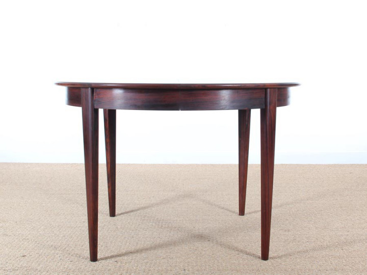 Scandinavian round dining table in Rio rosewood