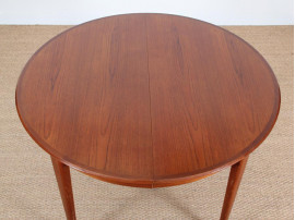 Table de repas scandinave ronde en teck extensible 4/10 pers.