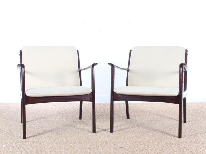 Pair of mahogany scandinavian armchairs