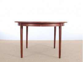 Mid-Century Modern Danish round dining table in teak. 4/8 seats