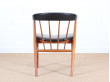 Suite de 4 fauteuils scandinaves en teck et simili cuir