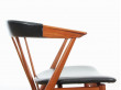 Suite de 4 fauteuils scandinaves en teck et simili cuir