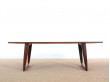 Mid-Century  modern large  coffe table in Rio rosewood with sledge legs.