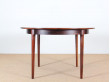 Mid-Century Modern danish extendable round dining table in Rio rosewood. 