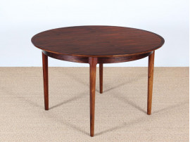 Mid-Century Modern danish extendable round dining table in Rio rosewood. 