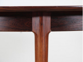 Mid-Century Modern danish extendable round dining table in Rio rosewood. 