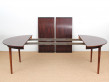 Mid-Century Modern danish extendable round dining table in Rio rosewood. 