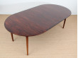 Mid-Century Modern danish extendable round dining table in Rio rosewood. 