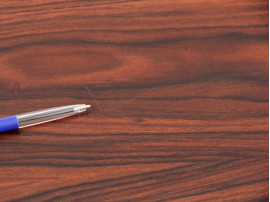 Mid-Century Modern danish extendable round dining table in Rio rosewood. 
