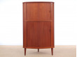 Angle bar cabinet with tambour doors