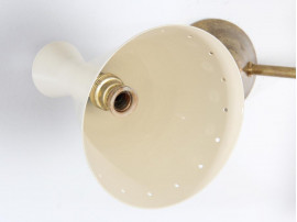 Mid century modern pair of white Diabolo wall lamp.