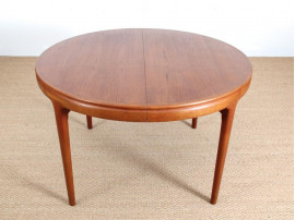 Table de repas scandinave ronde en teck extensible 4/10 pers.