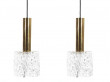 Mid century modern pair of pendant lamps in glass and brass by Carl Fagerlund