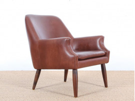 Fauteuil scandinave en cuir cognac