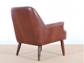 Fauteuil scandinave en cuir cognac