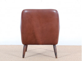 Fauteuil scandinave en cuir cognac