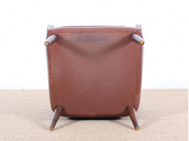 Fauteuil scandinave en cuir cognac