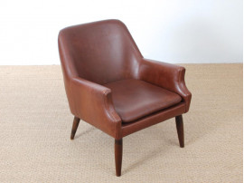 Fauteuil scandinave en cuir cognac