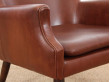 Fauteuil scandinave en cuir cognac