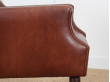 Fauteuil scandinave en cuir cognac