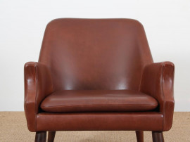 Fauteuil scandinave en cuir cognac