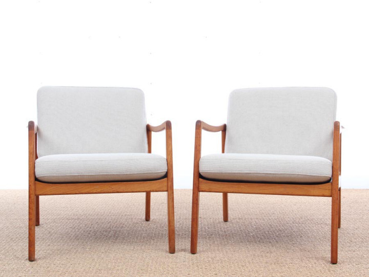 Mid-Century Modern Danish pair of  lounge chairs in teak model 110 by Ole Wanscher