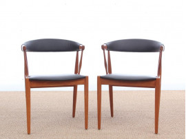 Mid century modern pair of armchair in teak and brown leather by Johannes Andersen