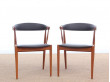 Mid century modern pair of armchair in teak and brown leather by Johannes Andersen