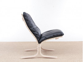 Mid modern century Siesta Classic armchair, low back by Ingmar Relling. New edition.