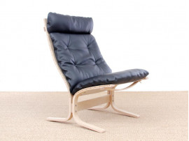 Mid modern century Siesta Classic armchair, hight back by Ingmar Relling. New edition.