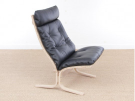 Mid modern century Siesta Classic armchair, hight back by Ingmar Relling. New edition.