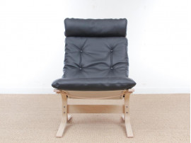 Mid modern century Siesta Classic armchair, hight back by Ingmar Relling. New edition.