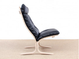 Mid modern century Siesta Classic armchair, hight back by Ingmar Relling. New edition.