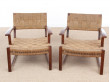 Mid-Century Modern pair of arm chairs  with woven sea grass.