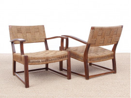 Mid-Century Modern pair of arm chairs  with woven sea grass.