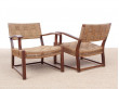 Mid-Century Modern pair of arm chairs  with woven sea grass.