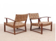 Mid-Century Modern pair of arm chairs  with woven sea grass.