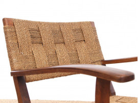 Mid-Century Modern pair of arm chairs  with woven sea grass.