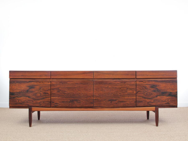 Mid-Century  modern scandinavian side bord in Rio rosewood by Ib Kofod Larsen for Faarup Mobelfabrik