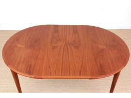 Table de repas scandinave ronde en teck  à 1rallonges 4/8 personnes