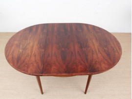 Table de repas scandinave ronde en palissandre de Rio à 1 rallonge 6/6 pers.