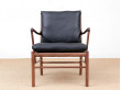 Mid-Century modern scandinavian Colonial arm chair in walnut by Ole Wanscher. New edition