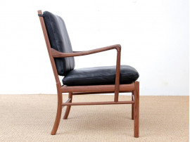 Mid-Century modern scandinavian Colonial arm chair in walnut by Ole Wanscher. New edition