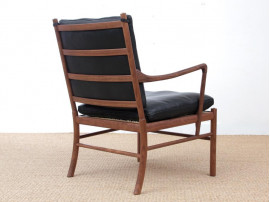 Mid-Century modern scandinavian Colonial arm chair in walnut by Ole Wanscher. New edition